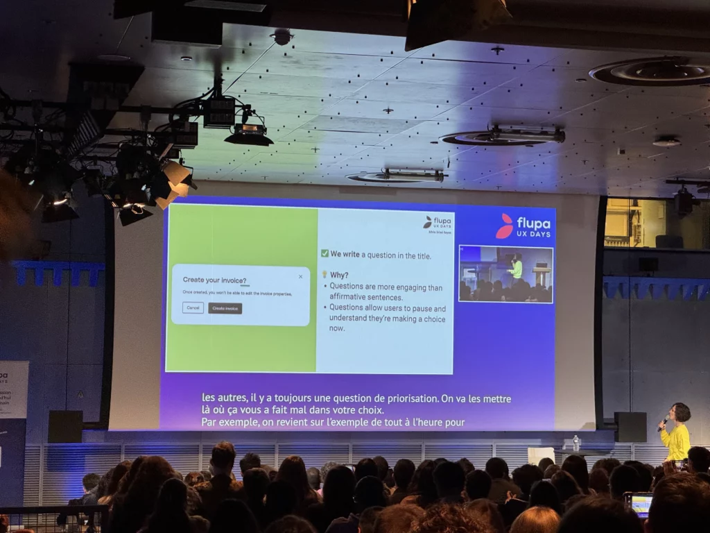 une photo de la conférence où on voit Silvia Griso Sayas présenter